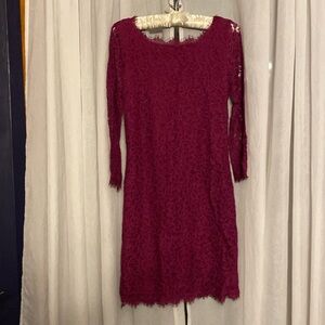 Beautiful plum colored lace dress, 3/4 sleeves, exposed zipper, never worn